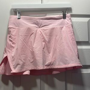 Lululemon pink tennis skort.  Pleated sides.  EUC.